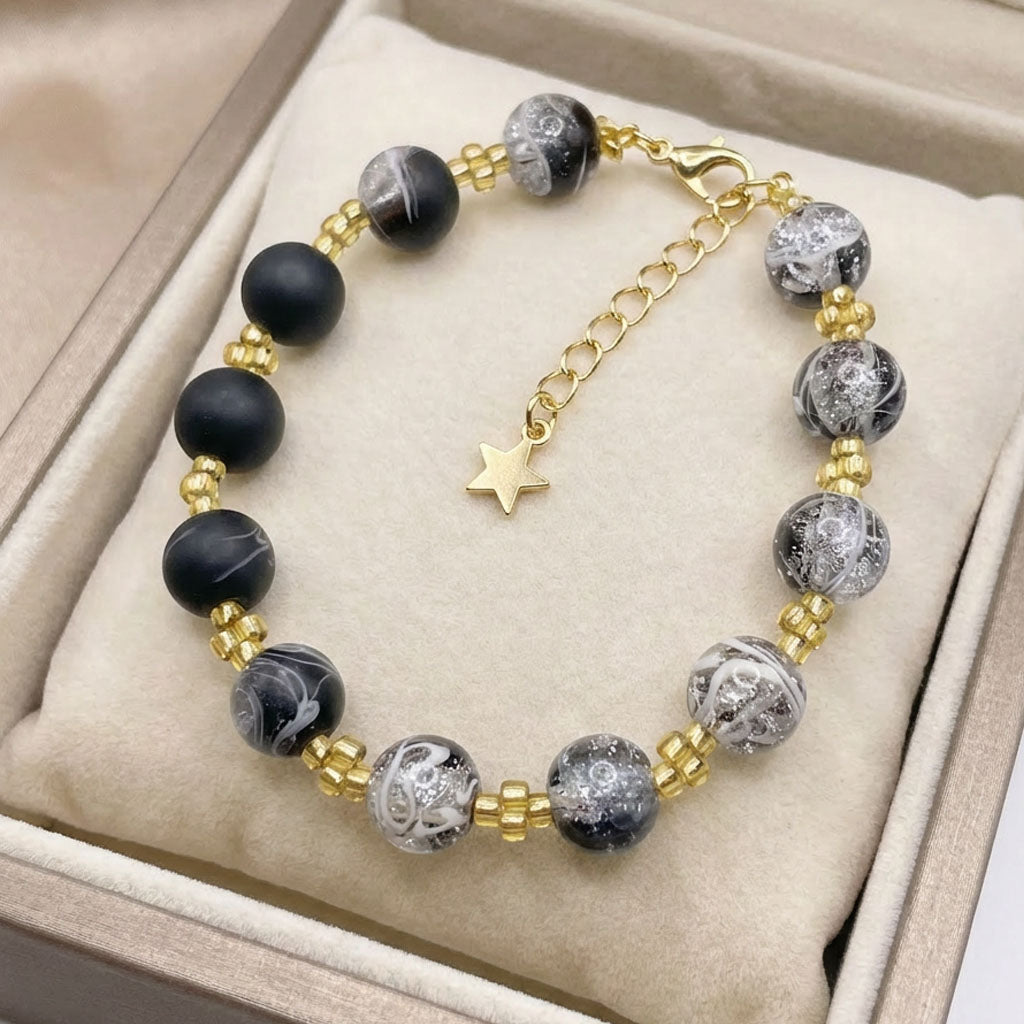 Midnight Aurelia Bracelet – Marble Beads with Gold Star Charm