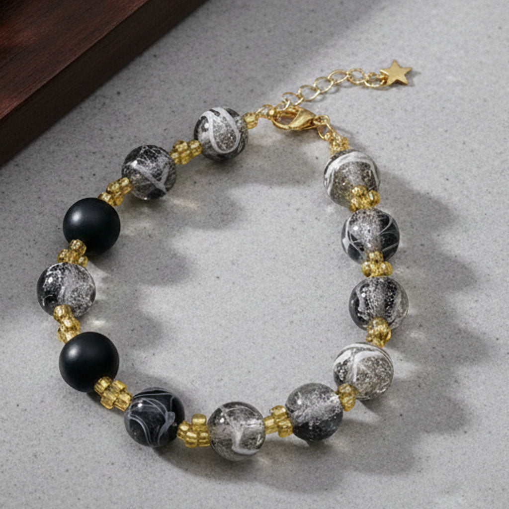 Midnight Aurelia Bracelet – Marble Beads with Gold Star Charm