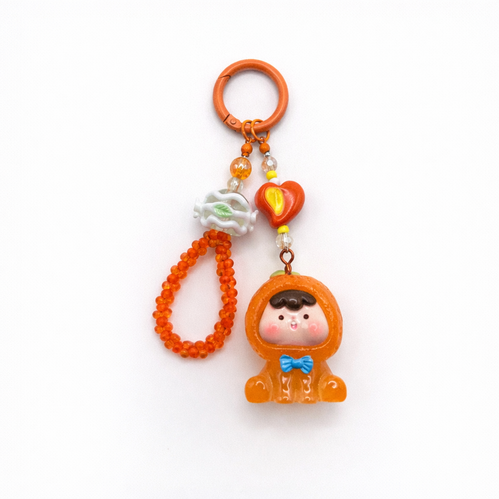 AEzelle Orange Dream Buddy Handmade Charm Keychain – Cute Resin Doll & Beaded Strap